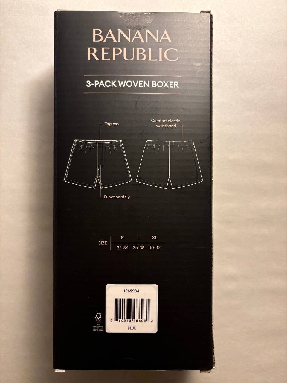 Back of sealed Banana Republic woven boxer 3-pack showing construction details and size chart